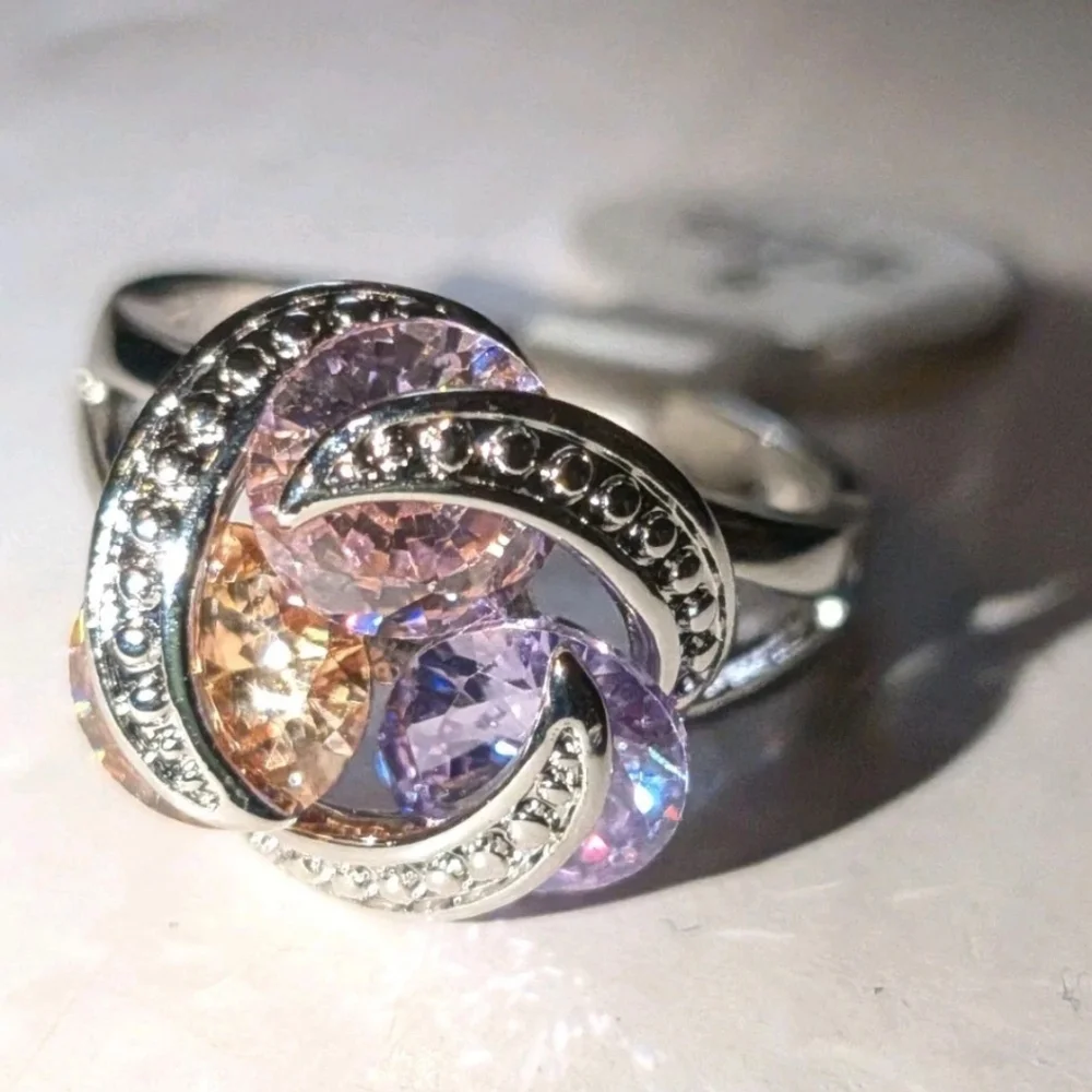 Sparkling Zirconia With Pink,yellow, and Purple Rotating Gemstone Design Sz 8
